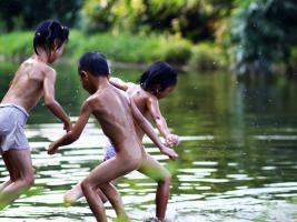 Sanjiang Village Boys Playing In River